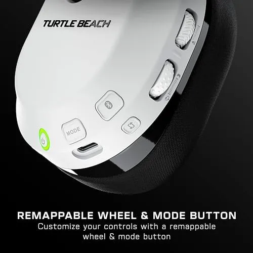 The headset charging from a USB cable on a desk