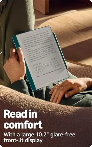 The Kindle Scribe charging via USB-C on a desk