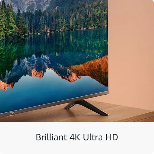 The Fire TV home screen showing streaming apps and live TV channels