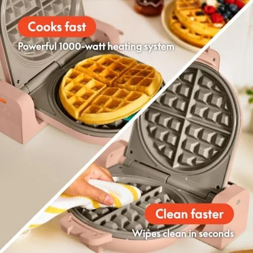 A plate of golden Belgian waffles with fresh berries and maple syrup