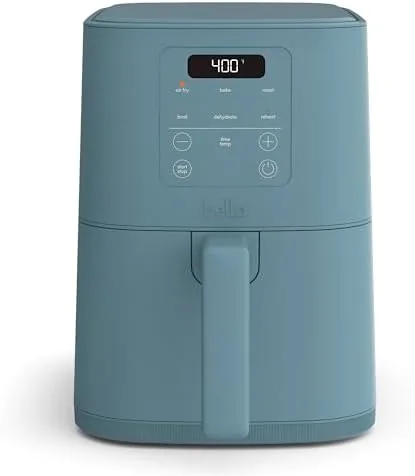 The Surf blue Bella Slim 4.0 QT air fryer on a kitchen counter beside a bowl of fries