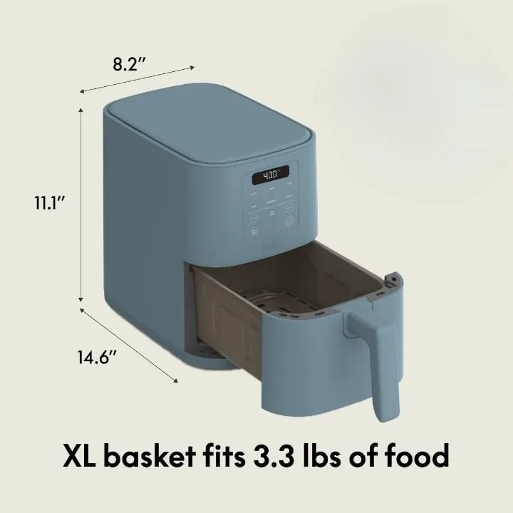 The basket and tray being rinsed under a tap during the cleaning test