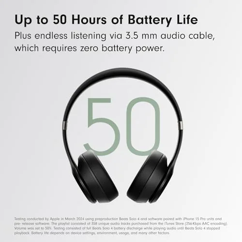 Beats Solo 4 Matte Black on a cafe table with a coffee