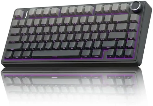The AULA F75 Pro on a desk with RGB backlighting glowing through the side printed keycaps