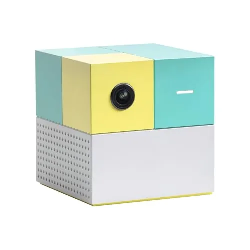Nex Playground device sitting on a TV stand in a living room