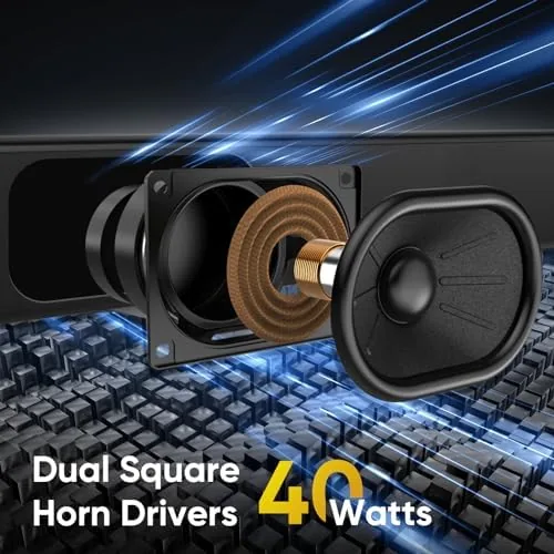 A movie action scene playing with the sound bar glowing softly beneath the TV
