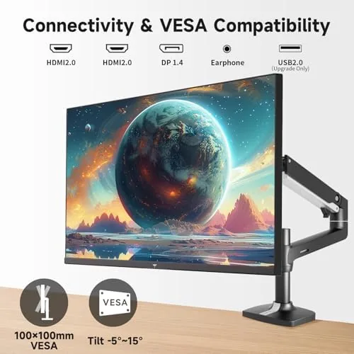 A full desk setup with the KTC monitor on a VESA arm beside a laptop