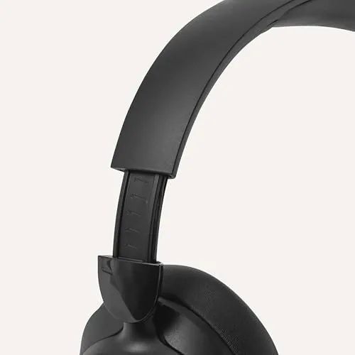 Person wearing the Amazon Basics ANC headphones on a commute