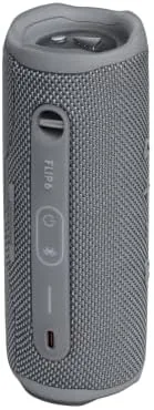 JBL Flip 6 speaker in the gray sleeve being carried on a hike