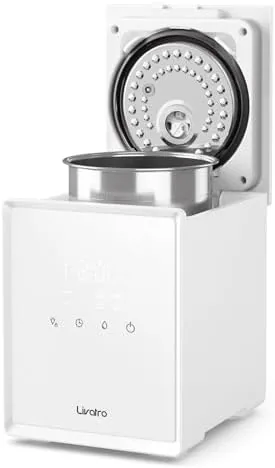The Livatro stainless steel humidifier on a nightstand in a bedroom