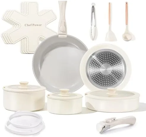 The full 19 piece ceramic nonstick cookware set arranged on a counter in granite grey and white