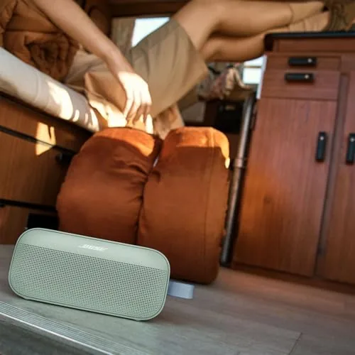 The speaker floating in a pool while playing music