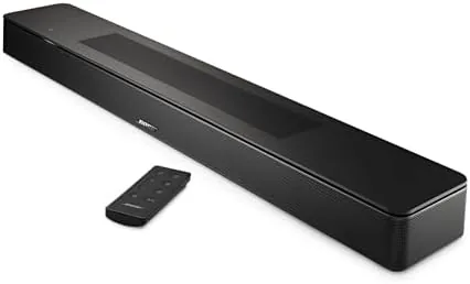 Close up of the soundbar showing the fabric grille and controls