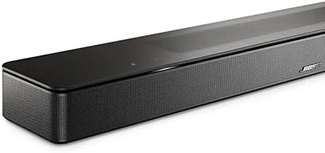 Living room setup with the soundbar playing a movie on screen