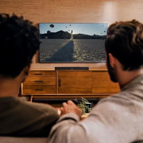 Apartment living room with the soundbar mounted beneath the TV