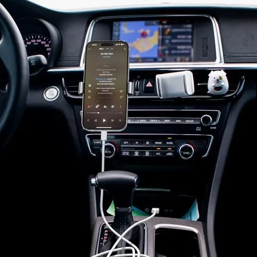 The cable connected from a car USB-A port to a phone in a dash mount