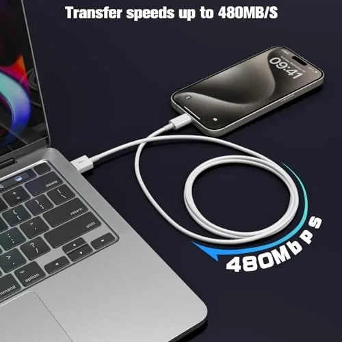 The cable plugged into a laptop transferring data from a USB-C iPad