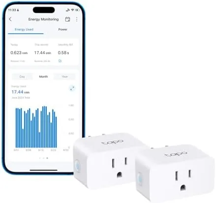 The Tapo P115 smart plug with its box on a table