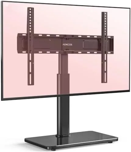 The Swivel table top TV stand holding a 65 inch television on a tempered glass base