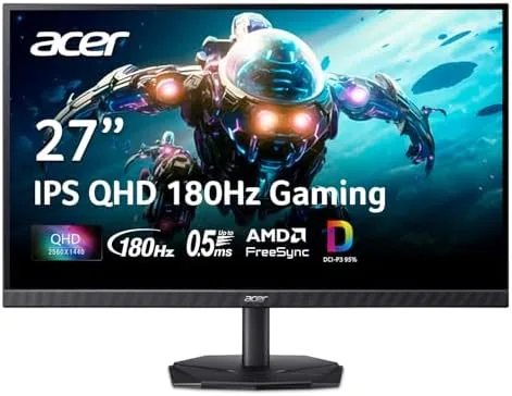 The Acer Nitro KG271U monitor set up on a desk with a gaming PC beside it