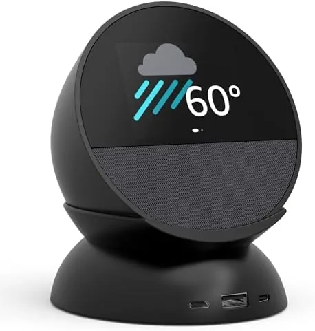 The Echo Spot 2024 resting on the charging stand on a nightstand