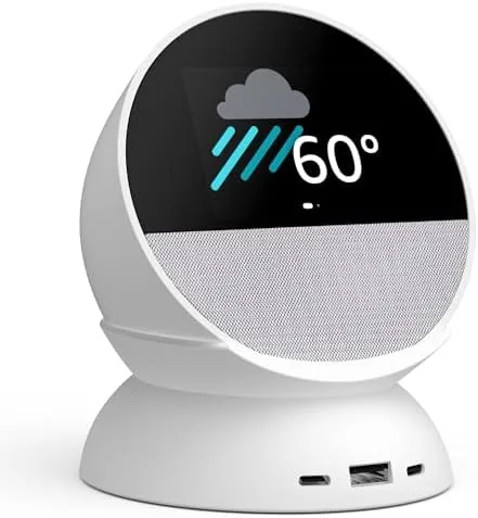 The Echo Spot bundle set up on a guest room nightstand