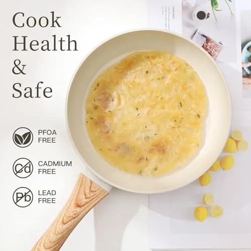 The non stick cookware set next to a stainless steel pan