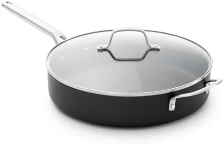 Washing the pan with a soft sponge in the sink