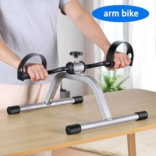 Person pedaling the RYGEO exerciser with their legs from a chair