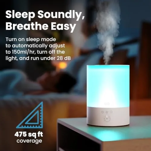 The humidifier running beside a crib in a nursery