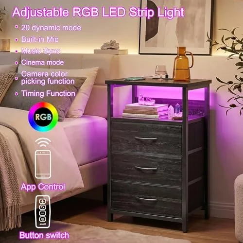 The Fixwal Night Stand with 3 Fabric Drawers, Nightstand with Charging in real use