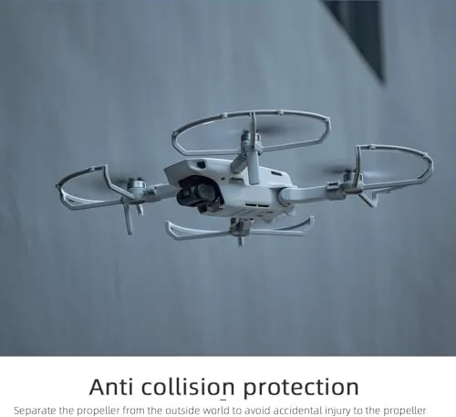 The guarded drone hovering low over grass during practice