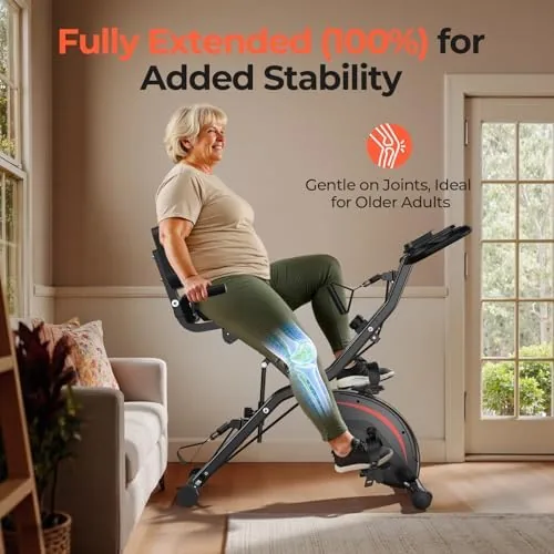 Rider using the Pleny folding exercise bike with the back support cushion in place
