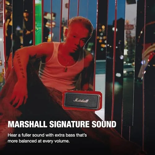 Close up of the brass control knob and the Marshall logo on the speaker