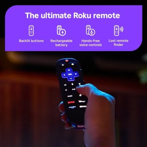 The Roku Ultra box on a side table next to a charging cable and remote