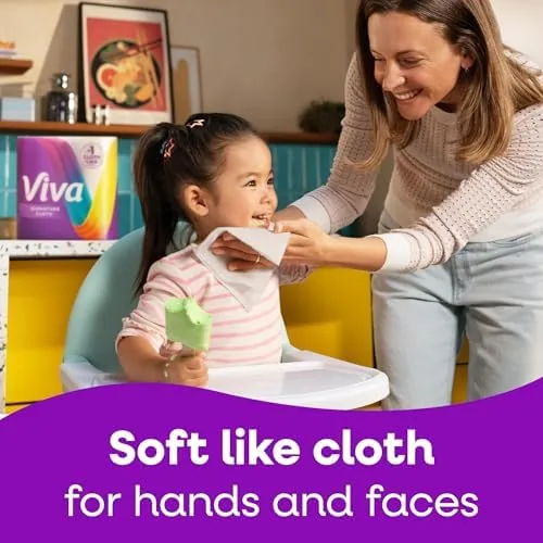 A coffee spill being lifted cleanly by one sheet of Viva