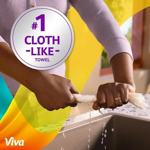 A sheet of Viva being used to clean a stainless steel sink