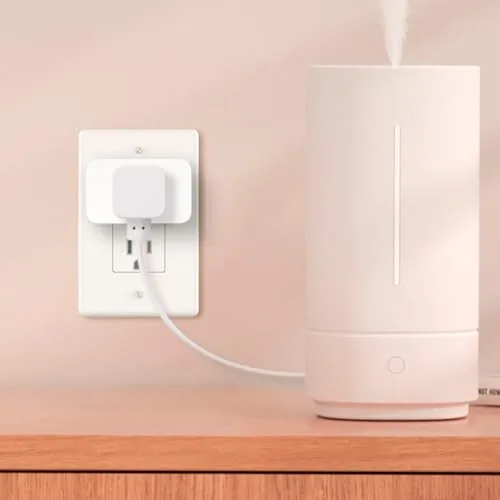 The side of a Tapo plug showing the manual power button
