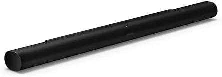 The Sonos Arc Ultra soundbar sitting on a media console beneath a television
