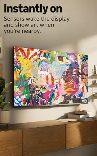 The Ambient Experience showing artwork and weather widgets on the idle screen