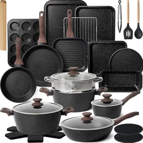 The full Kikcoin 31 piece cookware set arranged on a kitchen counter