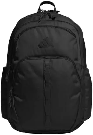 adidas Prime School Backpack 37L standing upright on a desk