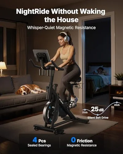 The MERACH bike in a bright room with a towel and water bottle nearby