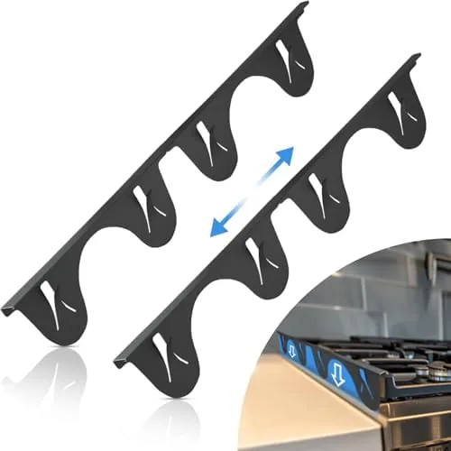 Stainless steel stove gap covers installed between a range and countertop