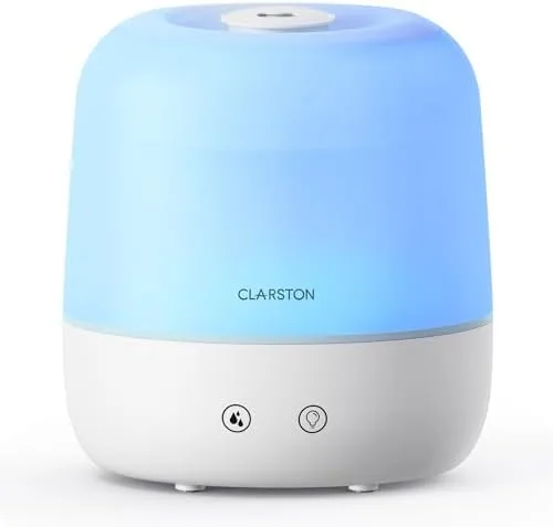 The Clarston 2L cool mist humidifier sitting on a bedroom nightstand