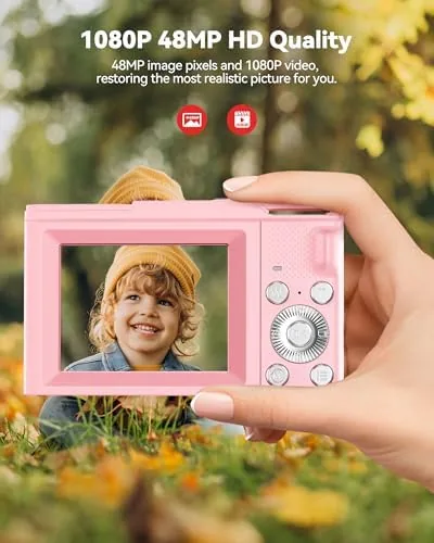 Close up of the large, simple buttons and small screen on the pink kids camera