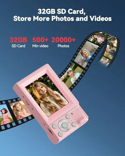 A child smiling while holding the pink camera after a photo session