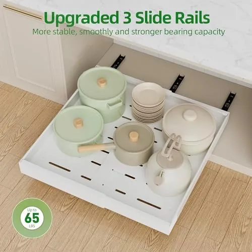 The PAKETA organizer drawer pulled out with cleaning supplies under a sink
