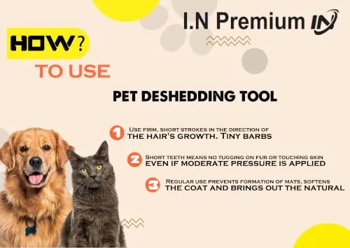 Cat being groomed with the compact deshedding brush