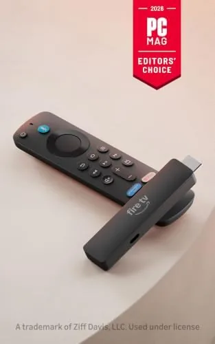 Fire TV Stick HD plugged into the HDMI port of a television